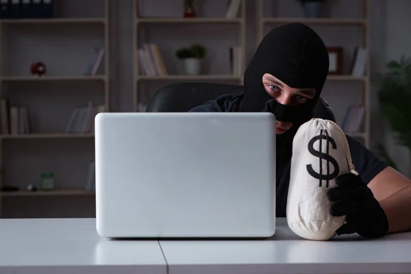 Hacker hacking computer late at night — Stock Photo, Image