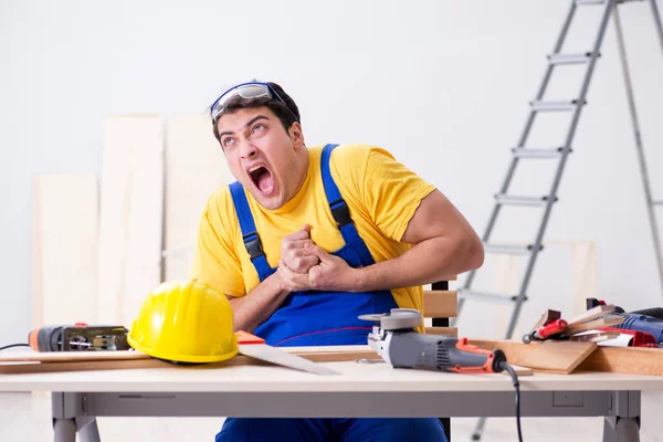 Floor repairman disappointed with his work — Stock Photo, Image