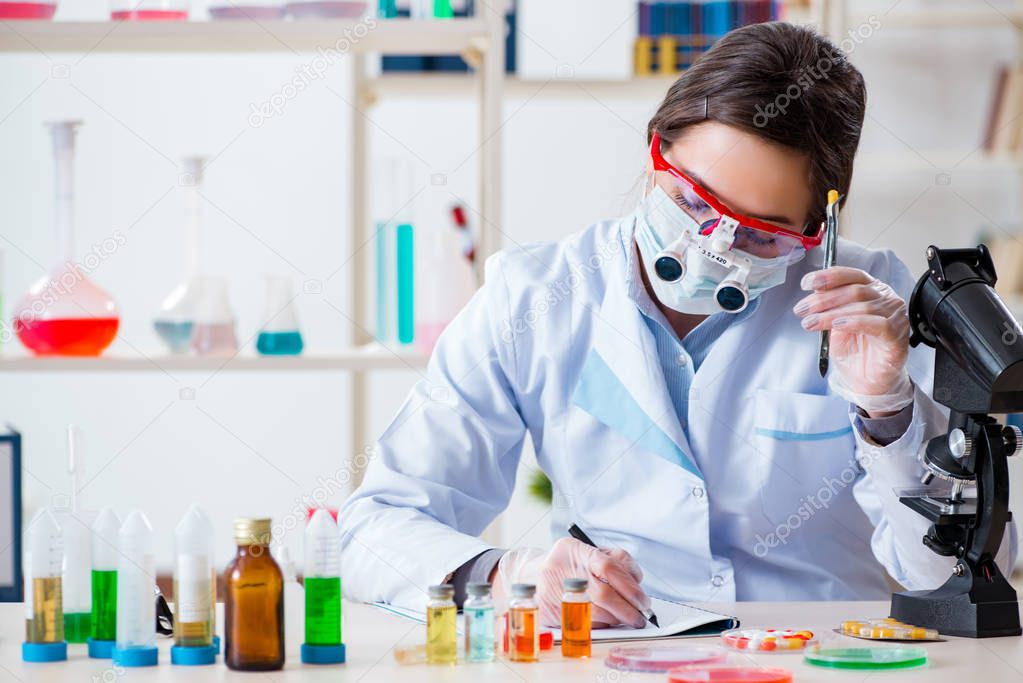 Lab assistant in drug synthesis concept