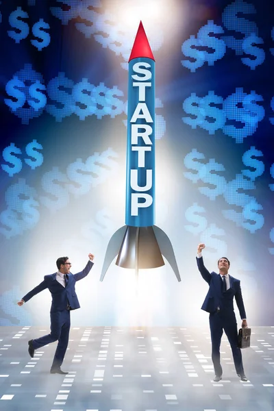 Start-up concept with rocket and businessman