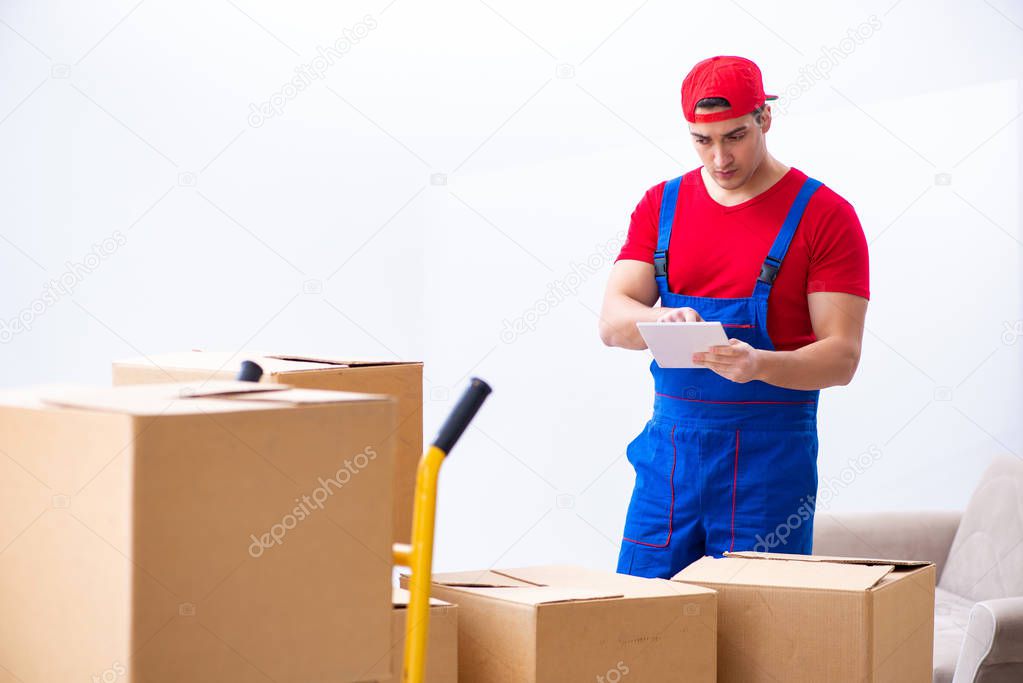 Contractor worker moving boxes during office move