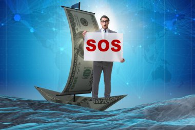 İş adamı teknedeki SOS mesajı için yardım istiyor.