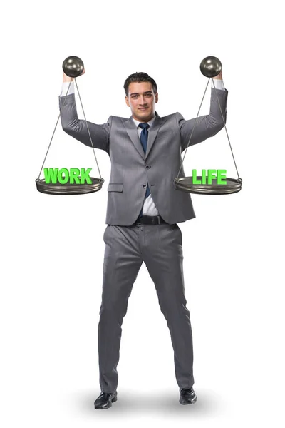 Businessman trying to find balance between home and work — Stock Photo, Image