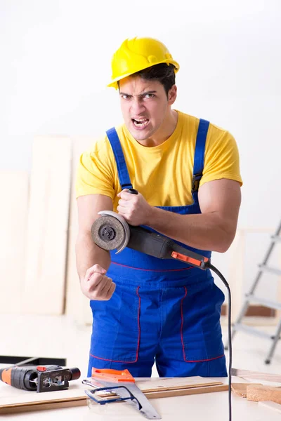 Floor repairman disappointed with his work — Stock Photo, Image