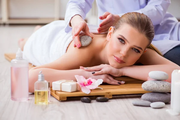 Young woman during spa procedure in salon