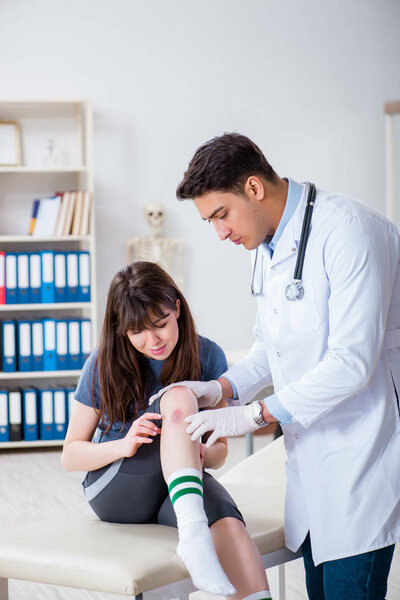 Patient visiting doctor after sustaining sports injury