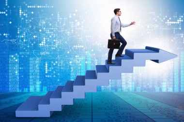 İş adamı iş dünyasında kariyer basamaklarını tırmanıyor