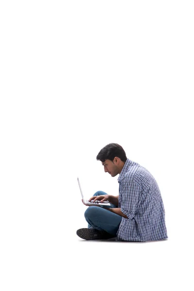 Jovem estudante com laptop isolado em branco — Fotografia de Stock