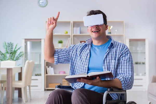Disabled student studying with virtual reality glasses