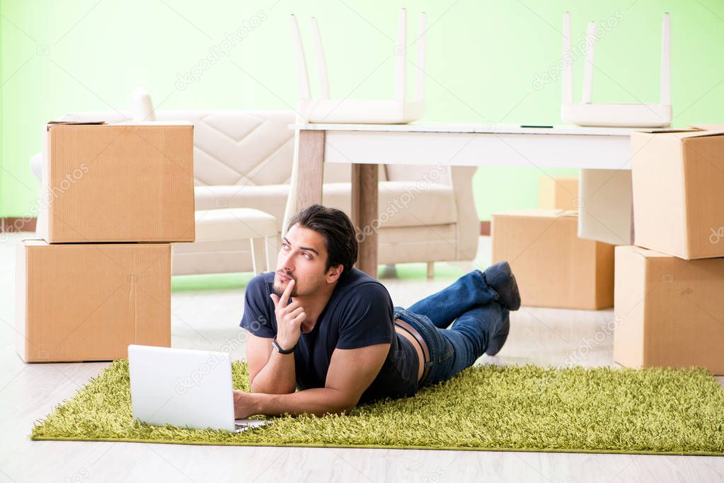 Man moving house with boxes