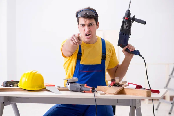 Floor repairman disappointed with his work — Stock Photo, Image