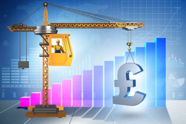 İnşaat vinci İngiliz poundunu kaldırıyor.