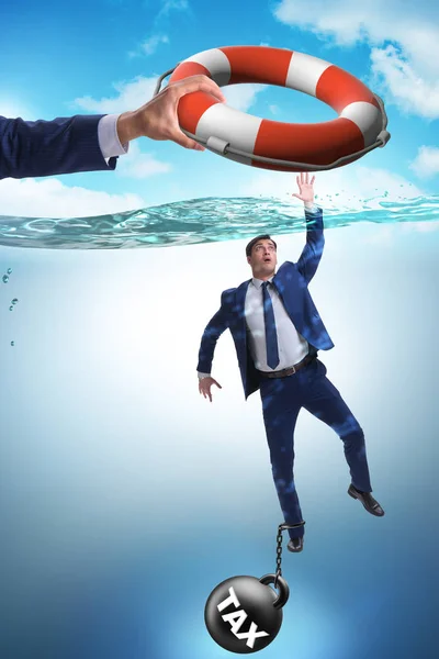 Businessman being saved from high taxes — Stock Photo, Image