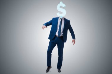 Kafası yerine dolar işareti olan bir iş adamı.
