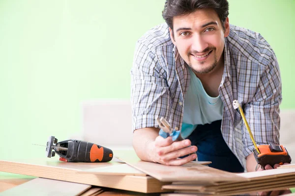 Woodworker working in his workshop