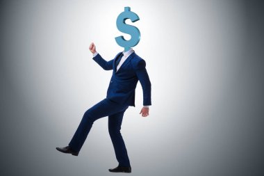 Kafası yerine dolar işareti olan bir iş adamı.