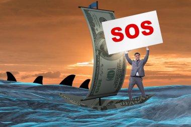 İş adamı teknedeki SOS mesajı için yardım istiyor.