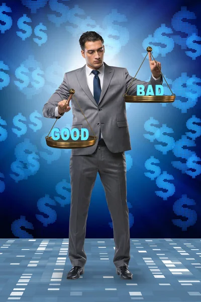 Businessman choosing between good and bad — Stock Photo, Image