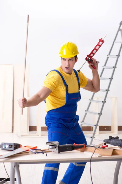 Floor repairman disappointed with his work — Stock Photo, Image