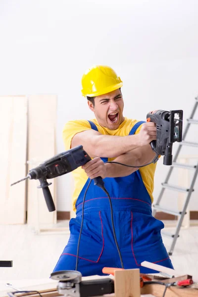 Floor repairman disappointed with his work — Stock Photo, Image