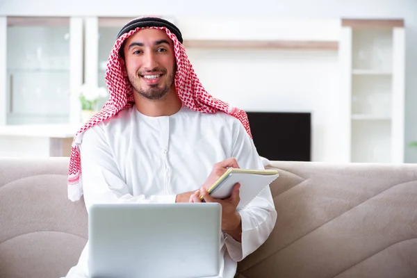 Arab man working at home on his work