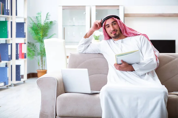 Arab man working at home on his work