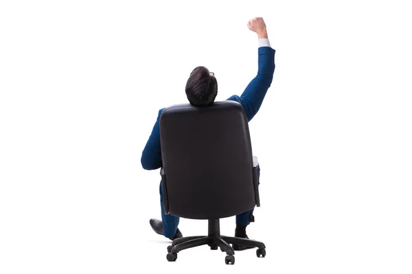 Empresário sentado na cadeira isolado em branco — Fotografia de Stock