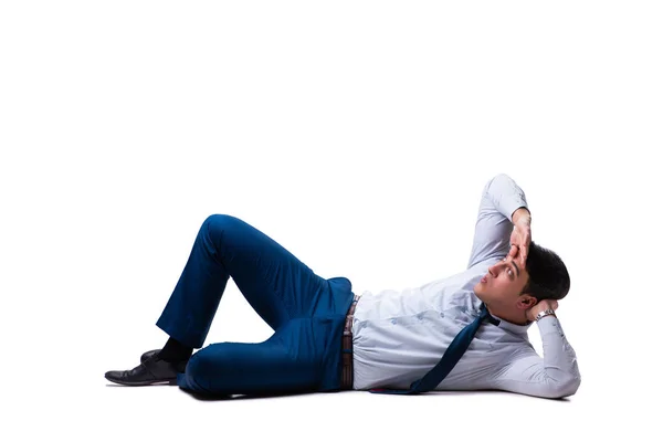 Businessman lying on the floor isolated on white — Stock Photo, Image