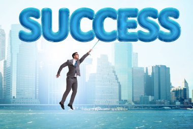 Başarı kavramı içinde uçan işadamı