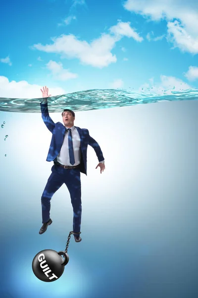 Businessman drowning under the burden of sin and guilt — Stock Photo, Image