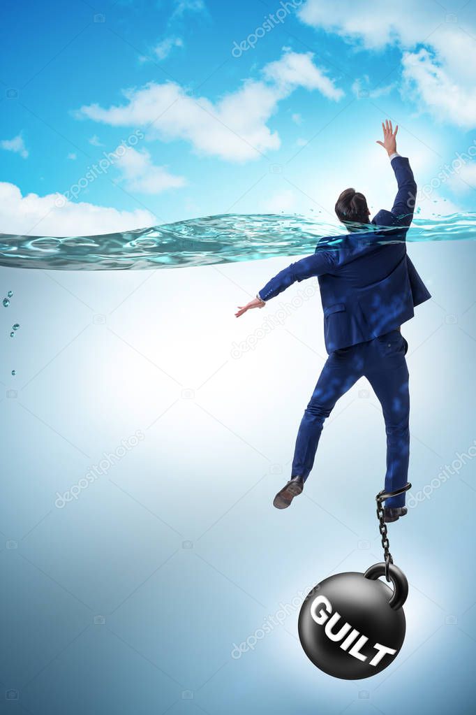 Businessman drowning under the burden of sin and guilt