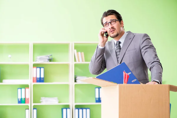 Male employee collecting his stuff after redundancy — Stock Photo, Image