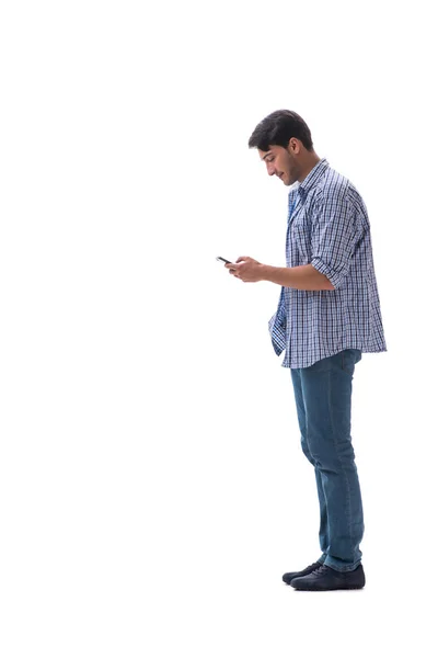 Joven estudiante con smartphone aislado en blanco — Foto de Stock