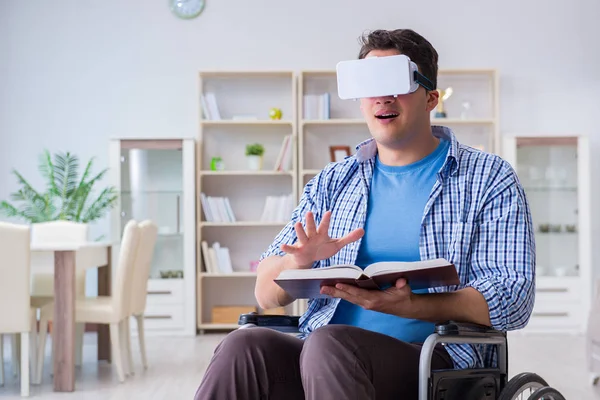 Disabled student studying with virtual reality glasses