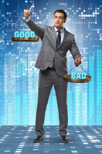 Businessman choosing between good and bad — Stock Photo, Image