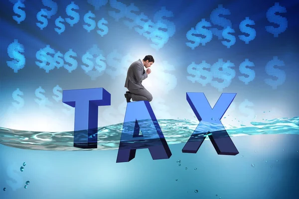 Zakenman die problemen heeft met het betalen van belastingen — Stockfoto