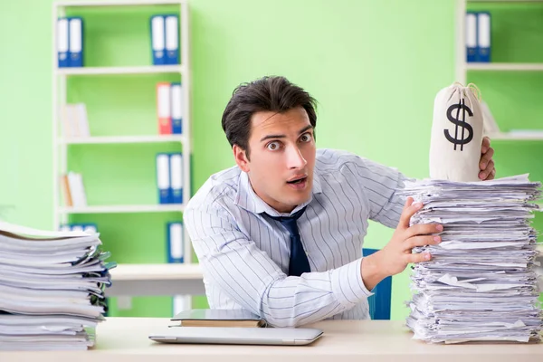 Businessman having problems with paperwork and workload Stock Image