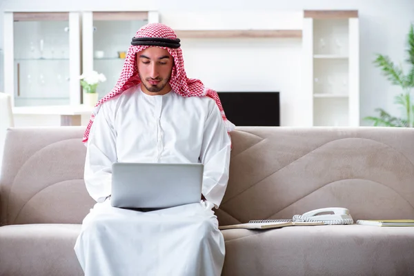 Arab man working at home on his work — Stock Photo, Image