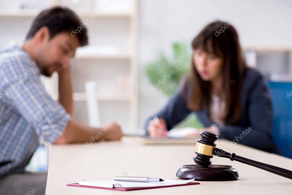 Female lawyer meeting with his male client in the office