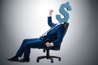 Kafası yerine dolar işareti olan bir iş adamı.