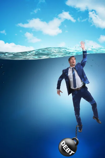 Businessman drowning in concept of high debt — Stock Photo, Image