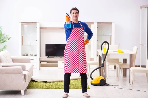 Contractor man cleaning house doing chores — Stock Photo, Image