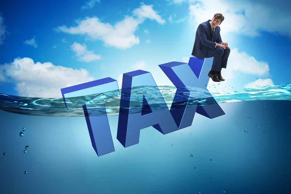 Businessman having problems with paying taxes — Stock Photo, Image