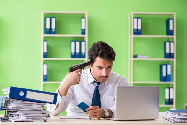 Despaired businessman thinking of suicide in the office — Stock Photo, Image