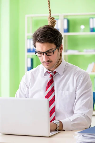 Despaired businessman thinking of suicide in the office — Stock Photo, Image