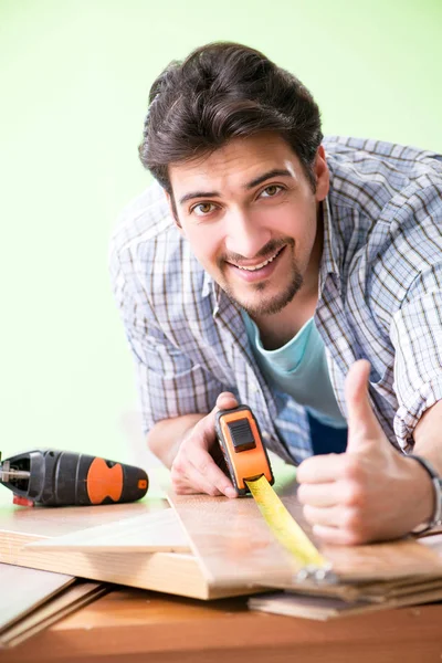 Woodworker working in his workshop — Stock Photo, Image