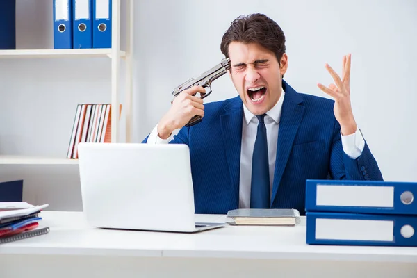 Young handsome businessman committing suicide in the office — Stock Photo, Image