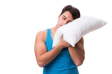 Beyaz arka plan üzerinde izole yastık ile genç adam