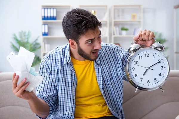 Man frustrated at bills he needs to pay in time management conce — Stock Photo, Image