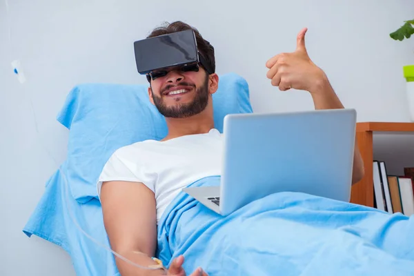 Patient in the hospital with VR glasses headset — Stock Photo, Image